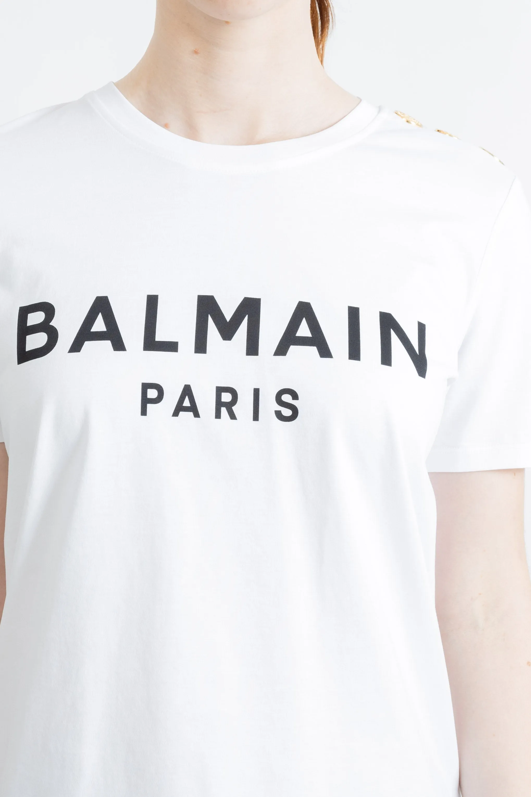 BALMAIN WOMEN WHITE TSHIRT WITH BLACK LOGO AND GOLDEN BUTTONS