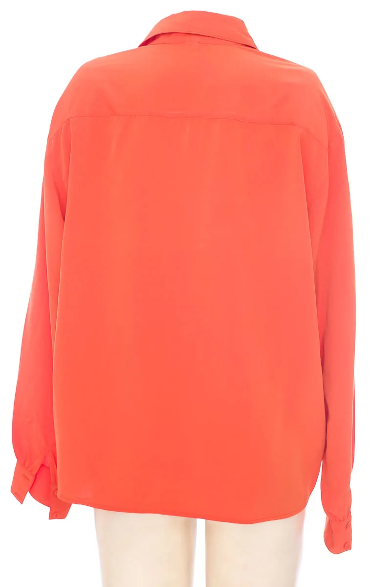 BLUSA COLOR NARANJA  CLOSEANDO